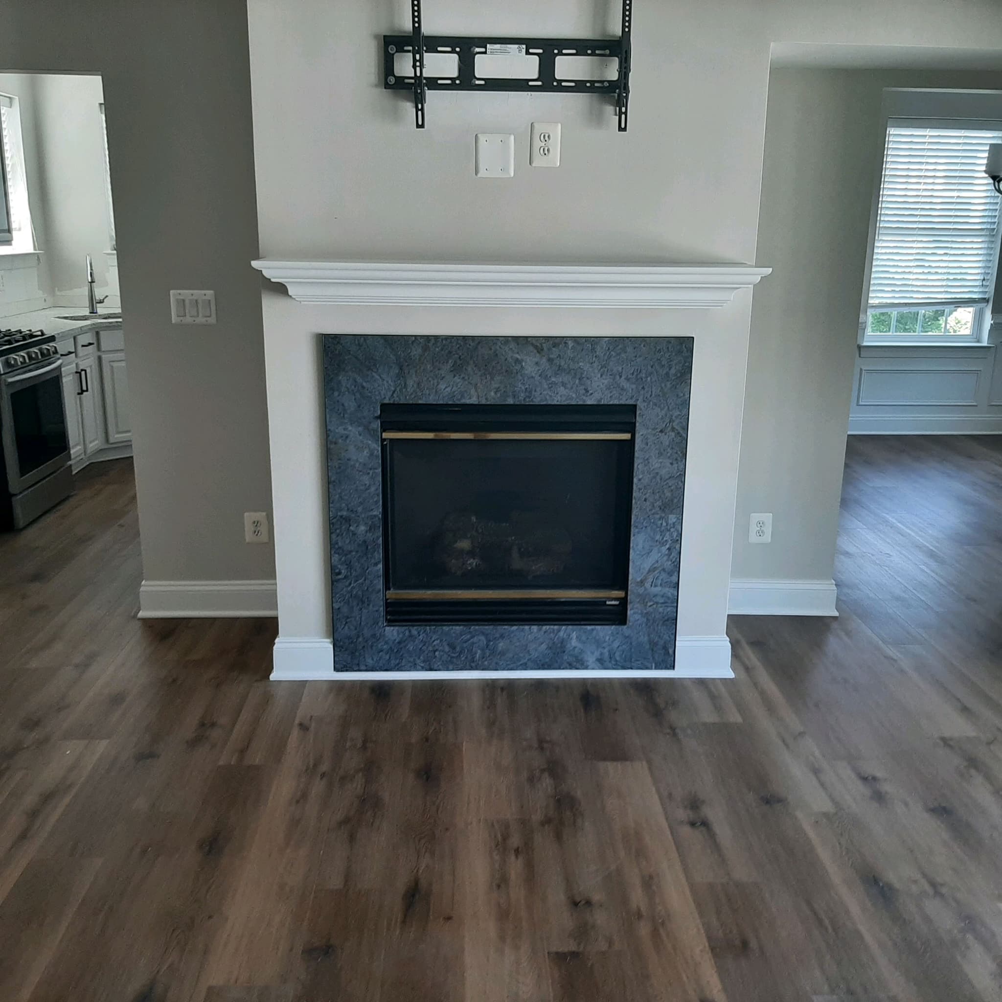 Fireplace with Polished Dark Wood Floor Fireplace with Polished Dark Wood Floor