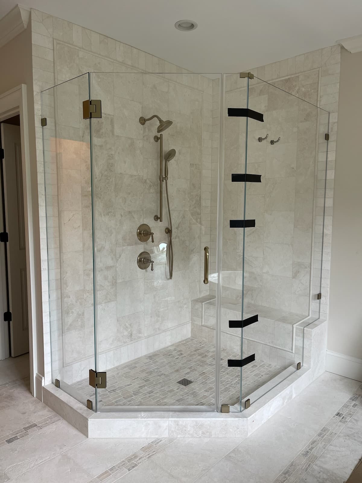 Modern Shower with Patterned Tile Floor Modern Shower with Patterned Tile Floor