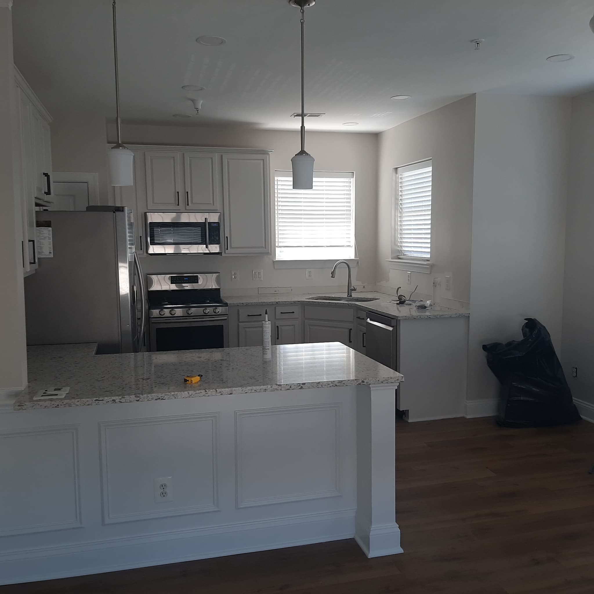 Granite Kitchen with Wood Floor Granite Kitchen with Wood Floor
